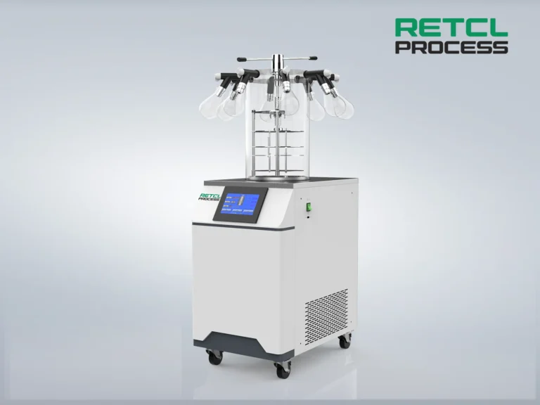 This image depicts a modern benchtop freeze dryer with a digital display, mounted on a wheeled base for mobility, ideal for specialized drying processes in laboratories.