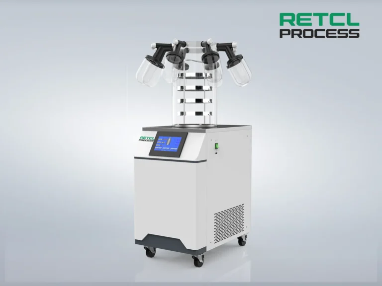A benchtop freeze dryer with multiple sample chambers and a digital display, mounted on a wheeled white and gray cabinet, isolated on a light background.