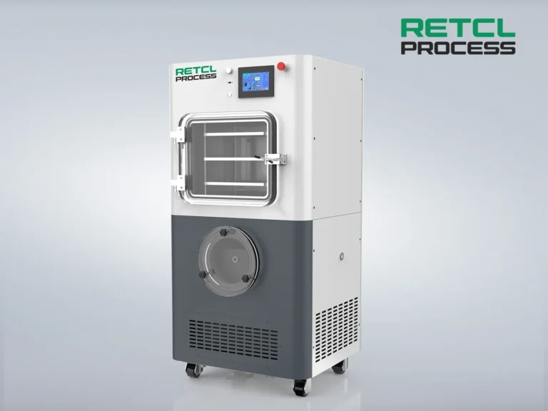The RETCL Process commercial pilot-scale freeze dryer with a digital control panel and vacuum chamber for efficient lyophilization and product processing.