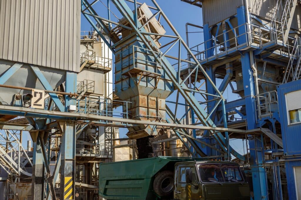 Industrial facilities and truck at production plant